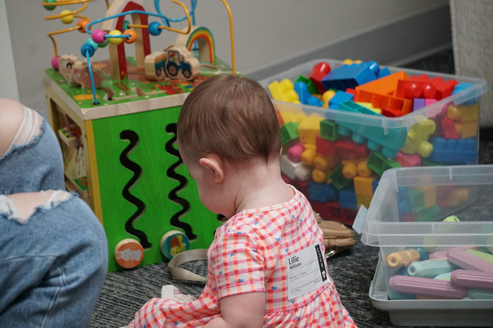 Baby playing in the B Kids nursery at Breath of Life Church