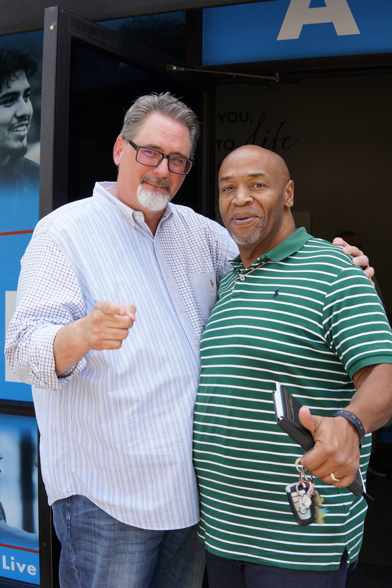 Pastor Justin Petrovich greeting a guest outside Breath of Life Church